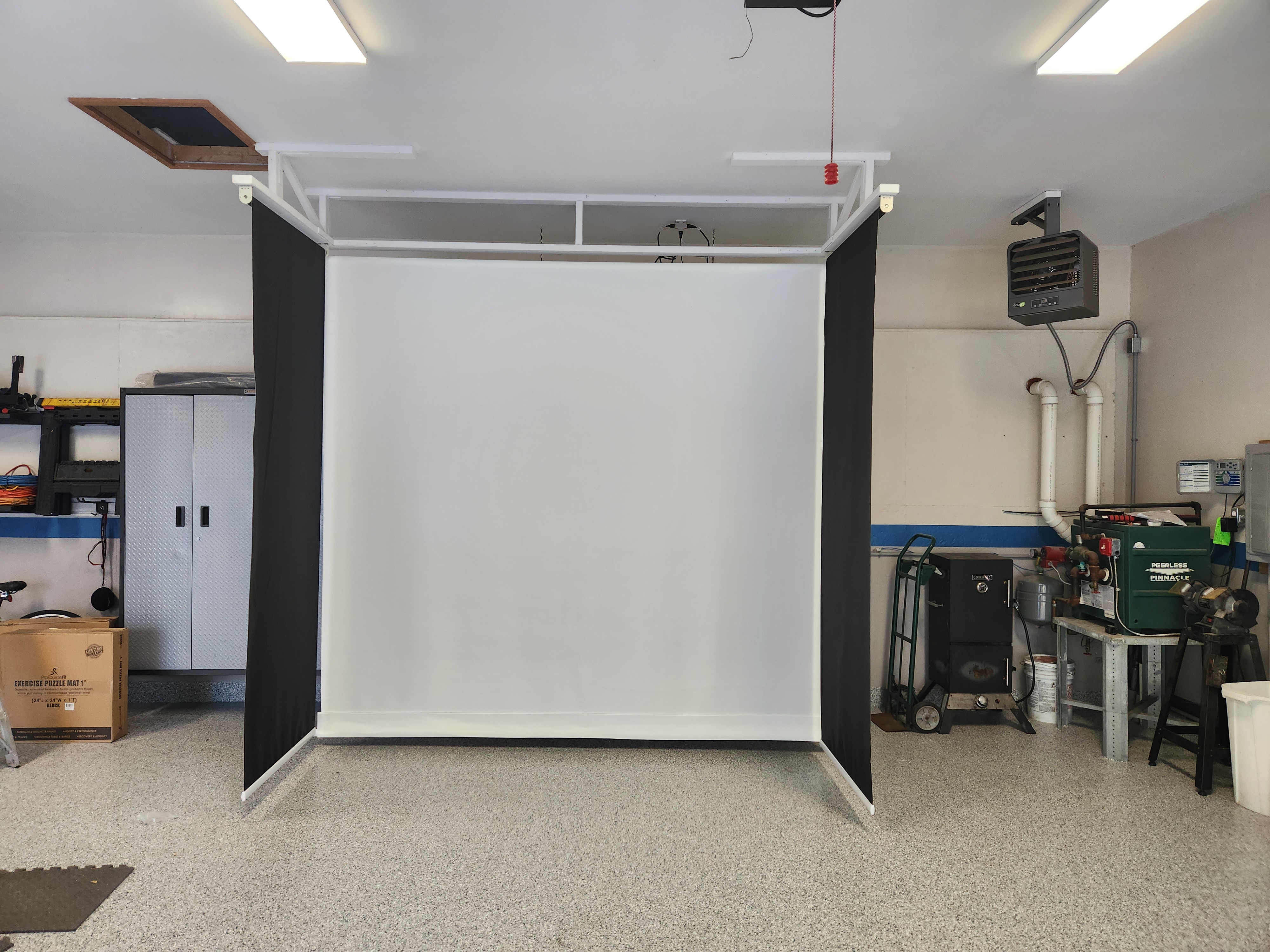 DIY retractable golf impact screen installation overhead structure METechs custom golf impact screen enclosure.jpg